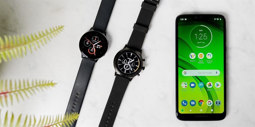 image of cell phone and smart watch image of cell phone and smart watch